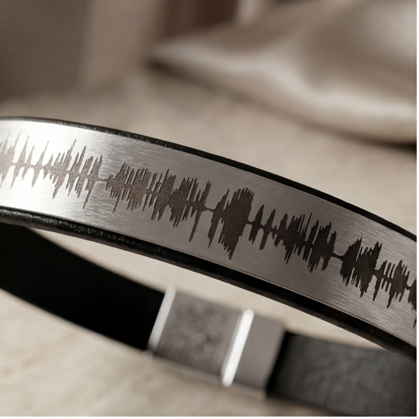 Men’s black leather bracelet engraved with custom soundwave and QR code clasp