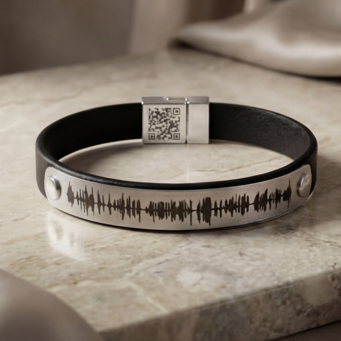 Men’s black leather bracelet engraved with custom soundwave and QR code clasp
